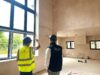 A photo of Chris Maughan and Simon Gallacher assessing progressing on a new build development from Stronghold Homes